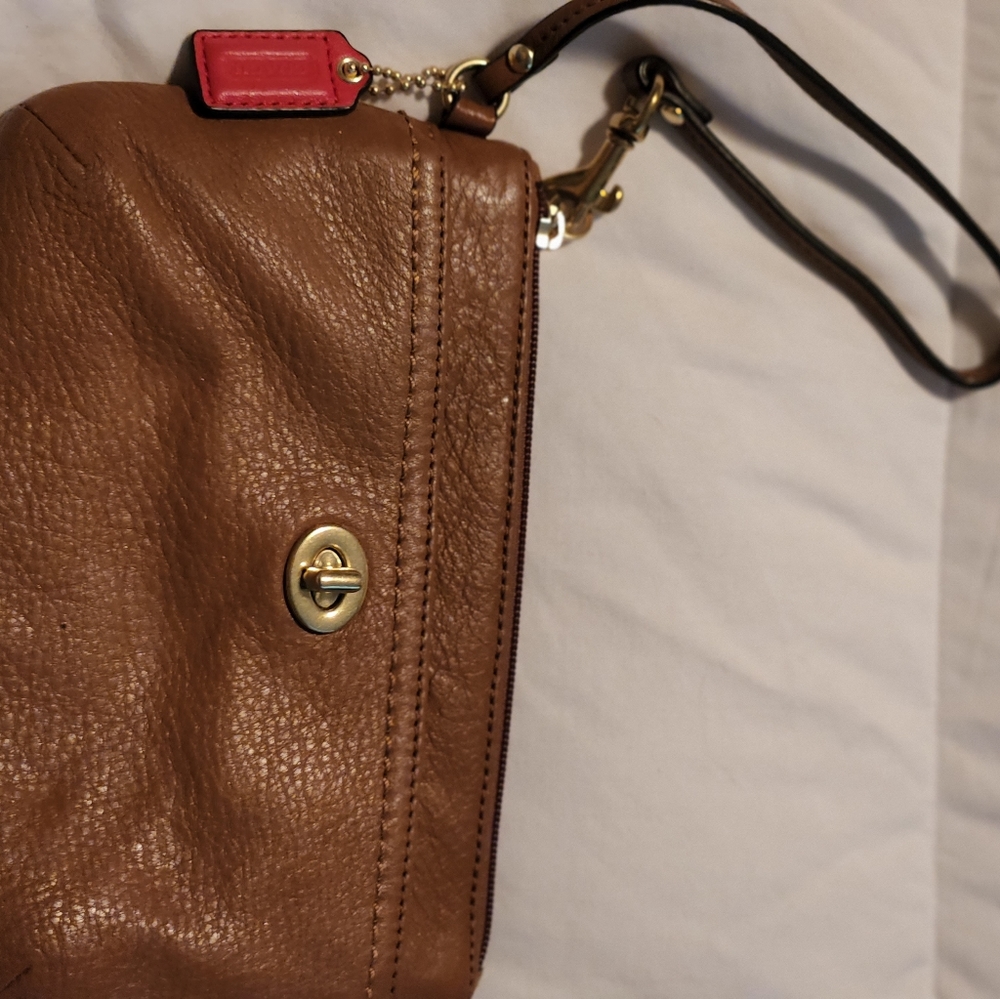 Coach like New leather wristlet.